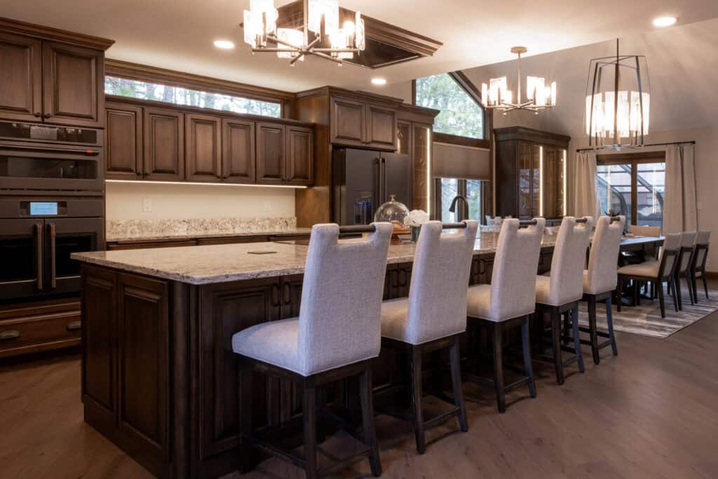 The interior of a restaurant with tables and chairs.