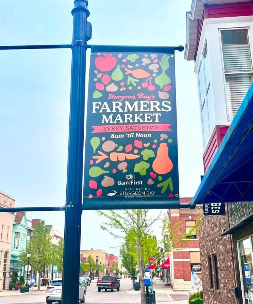 Farmers market sign in downtown Sturgeon Bay.