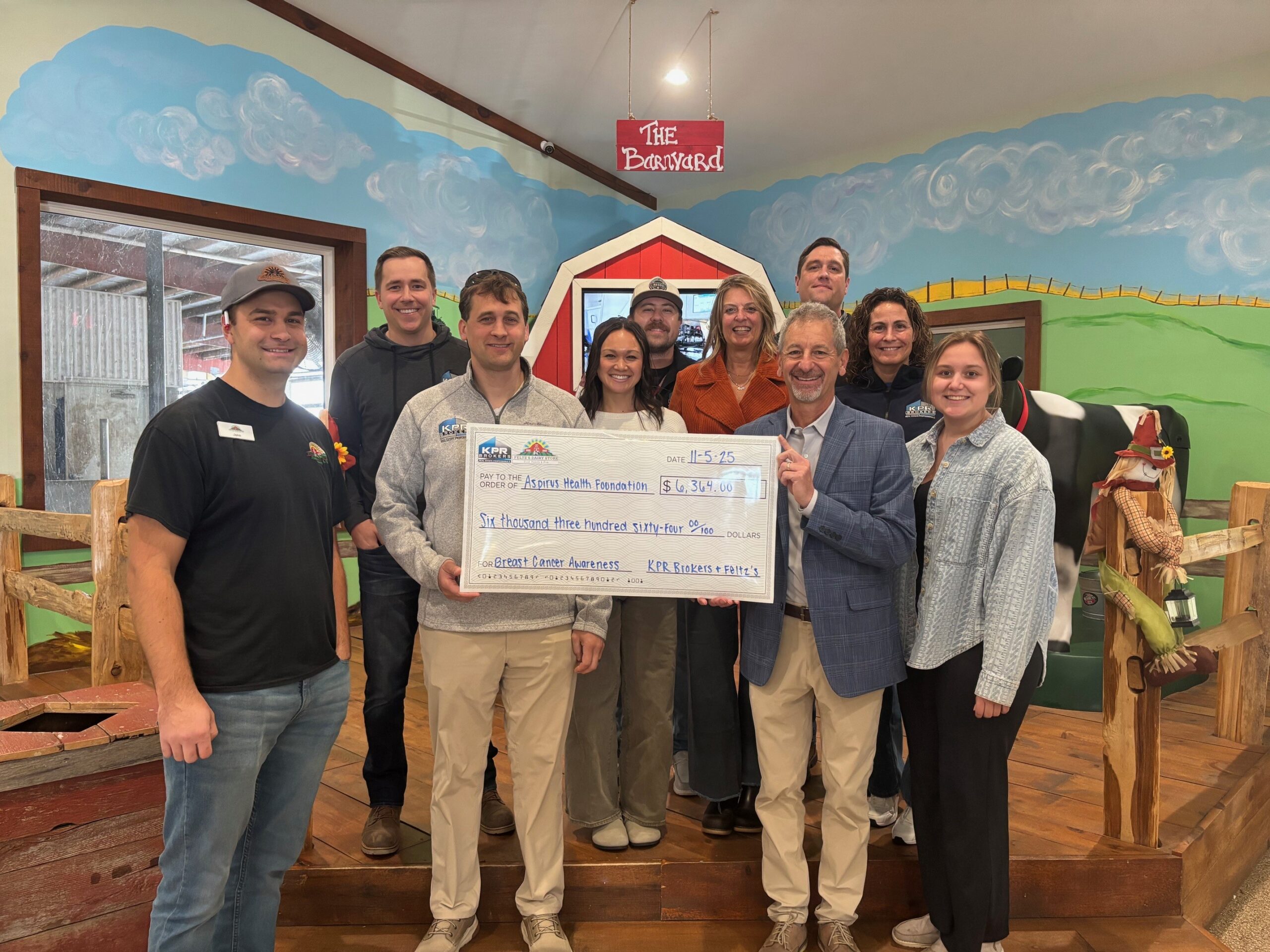 Steven Point Hospital KPR Brokers raises $6,300 for Aspirus Stevens Point Breast Care Center ...